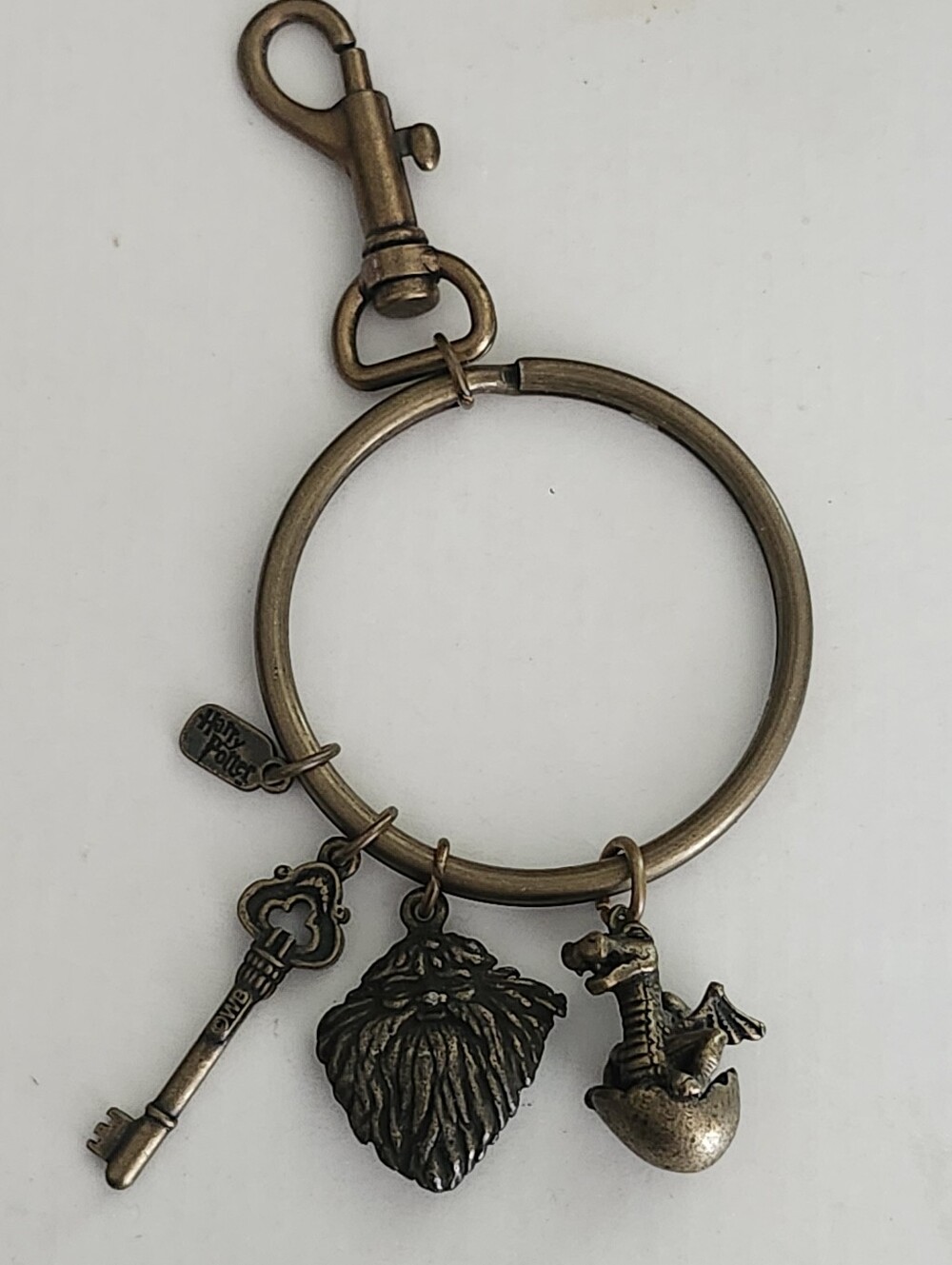 WB Harry Potter Bronze-tone Wizard Keyring With Dragon, Beard & Key Charms